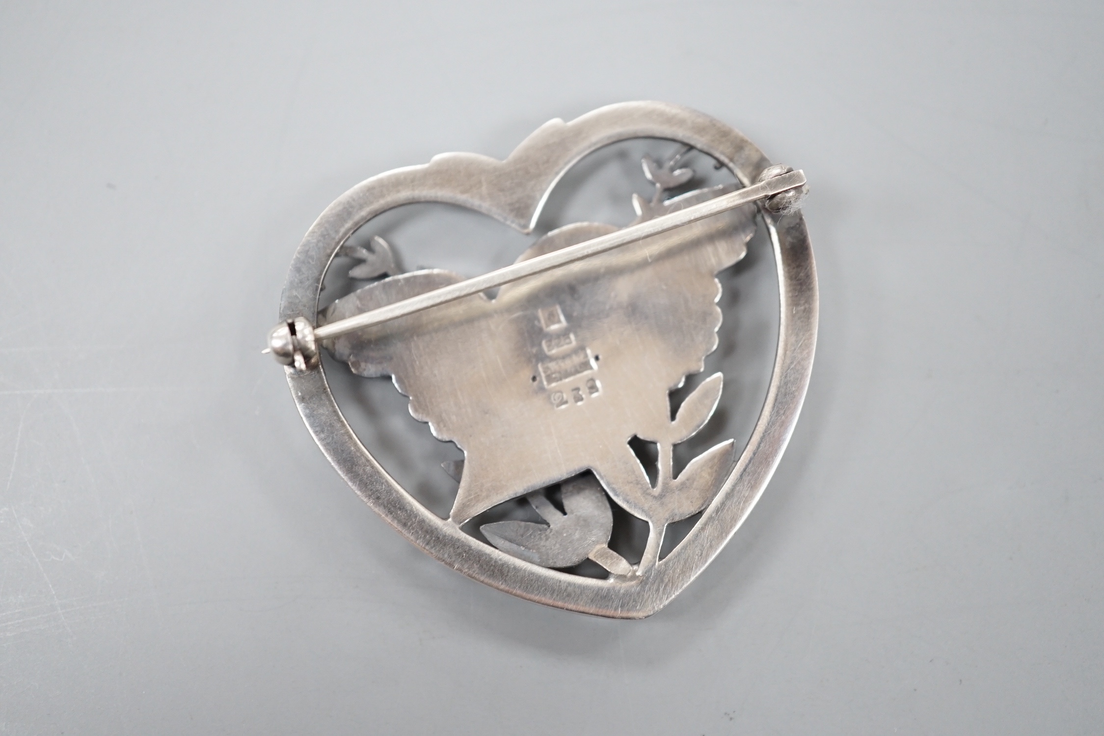 A Georg Jensen heart shaped 'robin with frond' brooch, no. 239, 38mm.